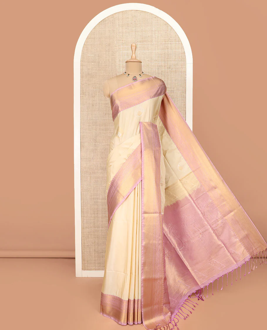 Sandal Semi-Soft Silk Saree Enthralled with Zari Buttas All Over Its Body, Complemented by a Contrast Traditional Zari Design Border, Pallu of Paisley Designs, and Paired with a Contrast Blouse