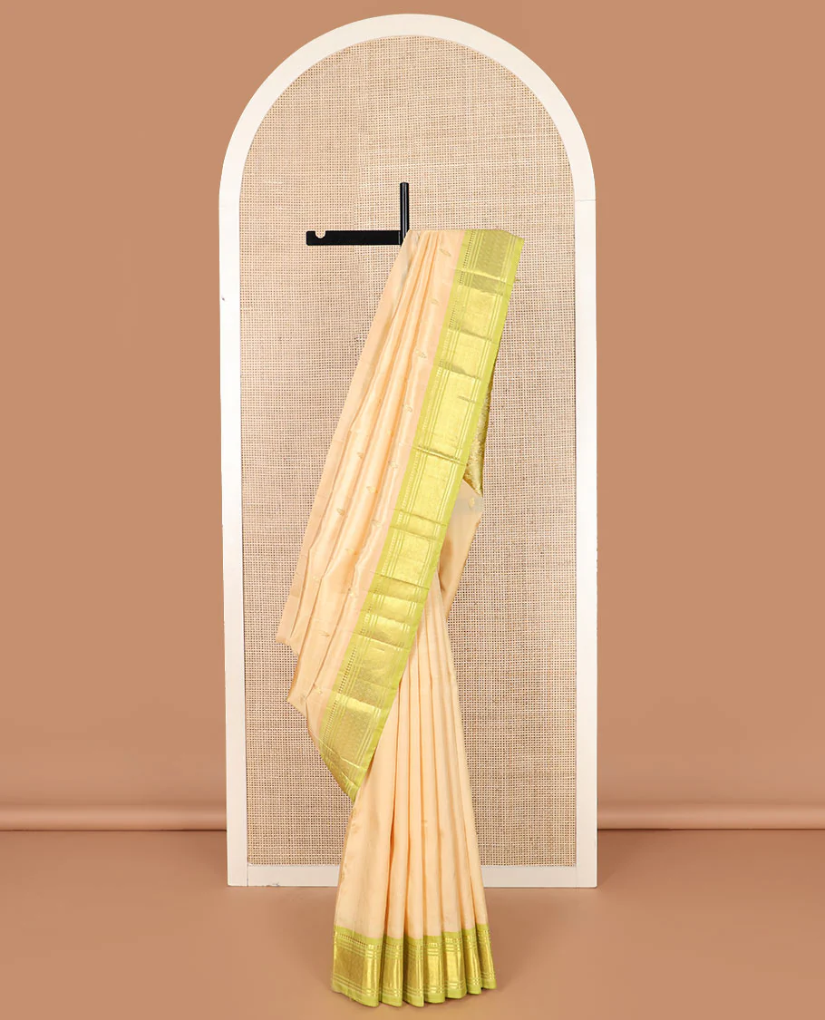 Sandal zari buttas Kanchipuram silk saree, contrast one-sided border of paneer sombu, banaras, and jaal designs, and pallu of floral designs