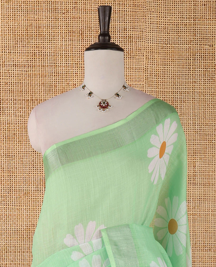 Sea green sunflower motif printed linen saree, silver zari plain border & small sunflower motif print blouse - Image 3