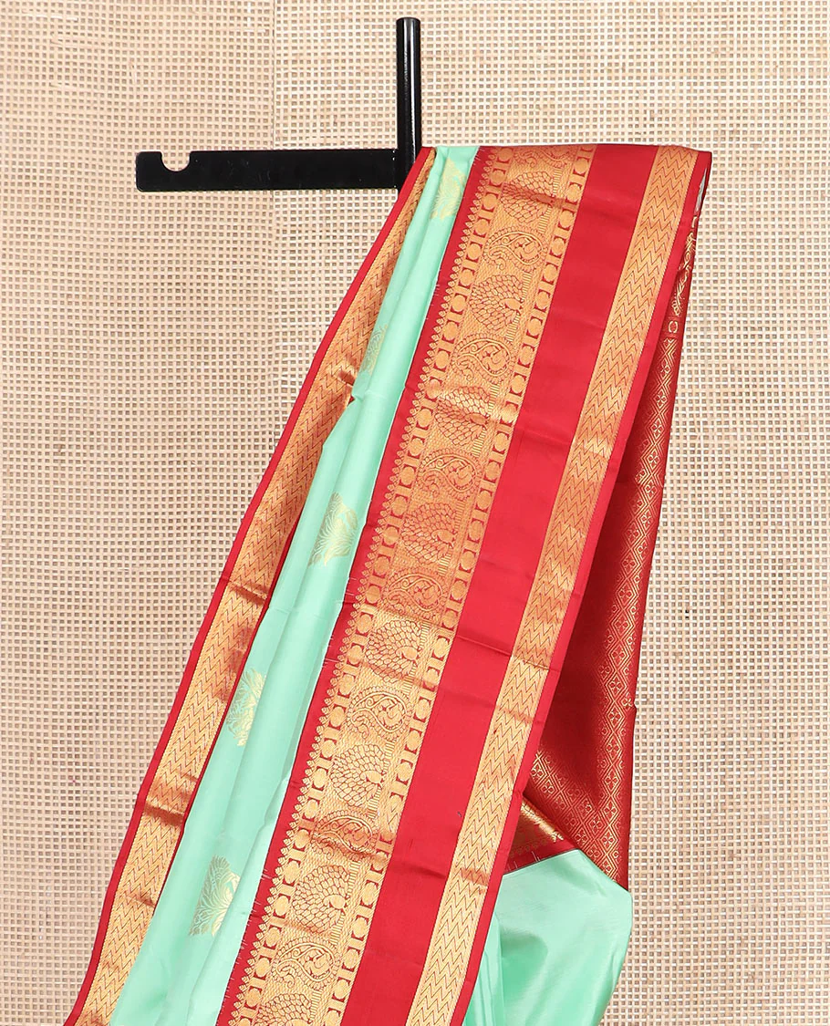 Sea green zari buttas Vasundhara silk saree, contrast korvai rettai pettu border of thilakam, mayil kann, rudraksham, and vanki designs, and jaal pallu - Image 3