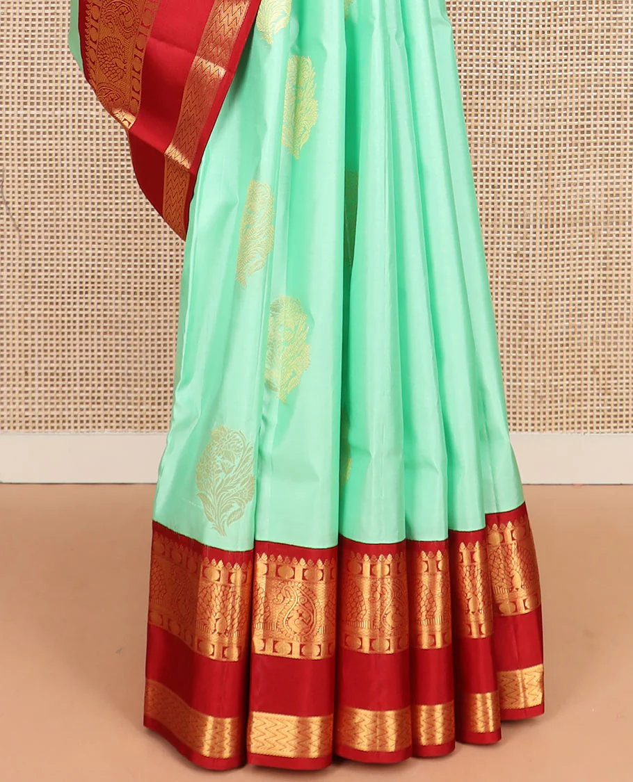 Sea green zari buttas Vasundhara silk saree, contrast korvai rettai pettu border of thilakam, mayil kann, rudraksham, and vanki designs, and jaal pallu - Image 4