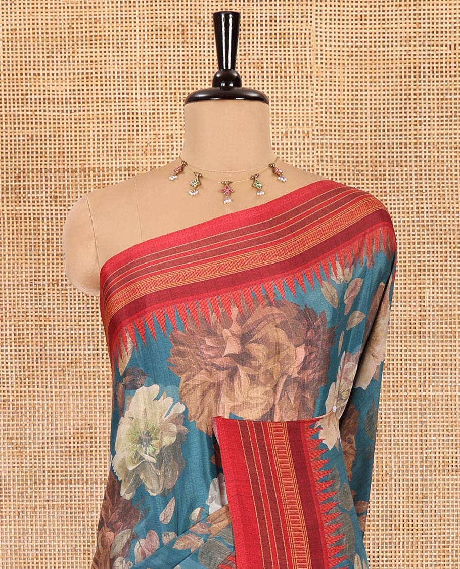 Teal blue floral printed Italian crepe saree, contrast temple printed border, striped pallu, and a printed bordered blouse - Image 3
