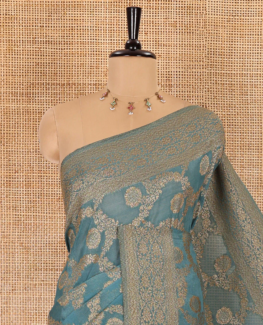 Teal blue jaal jacquard fancy crepe banaras khaddi saree, floral creeper design border, ogee patterned pallu, and a matching blouse - Image 2