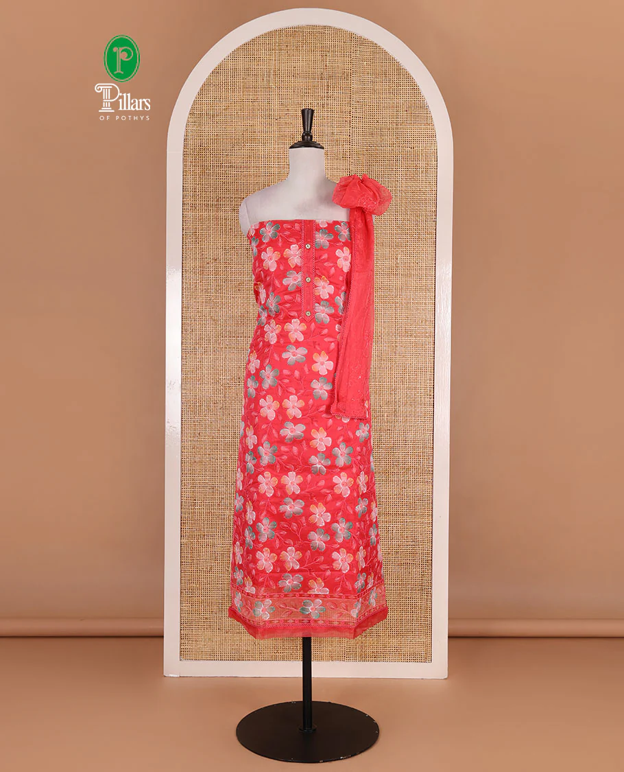 Tomato red churidar material set, floral print with thread outlined organza top, plain santoon bottom, and floral vine sequins embroidered organza dupatta