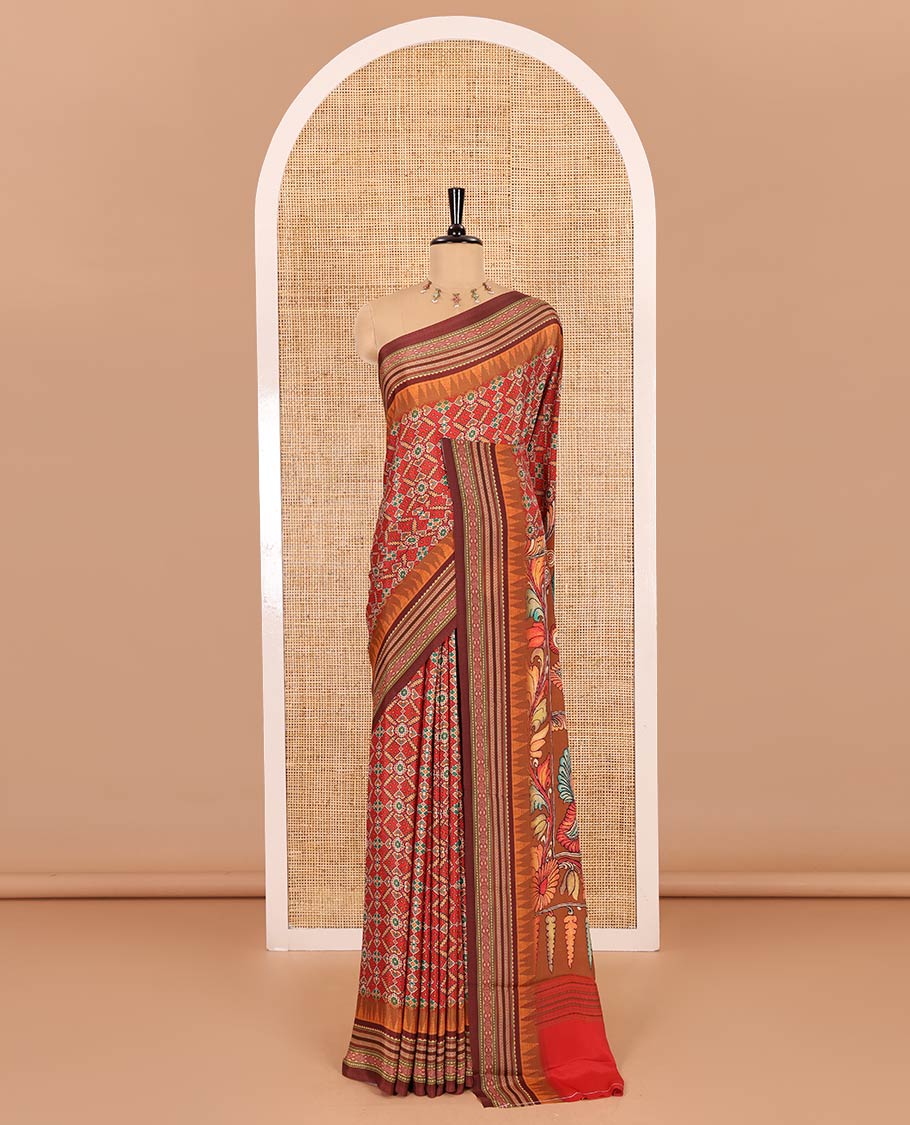 Tomato red patola style geometric printed Italian Crepe saree, contrast temple ikkat printed border, Kalamkari printed pallu, and a printed bordered blouse - Image 2
