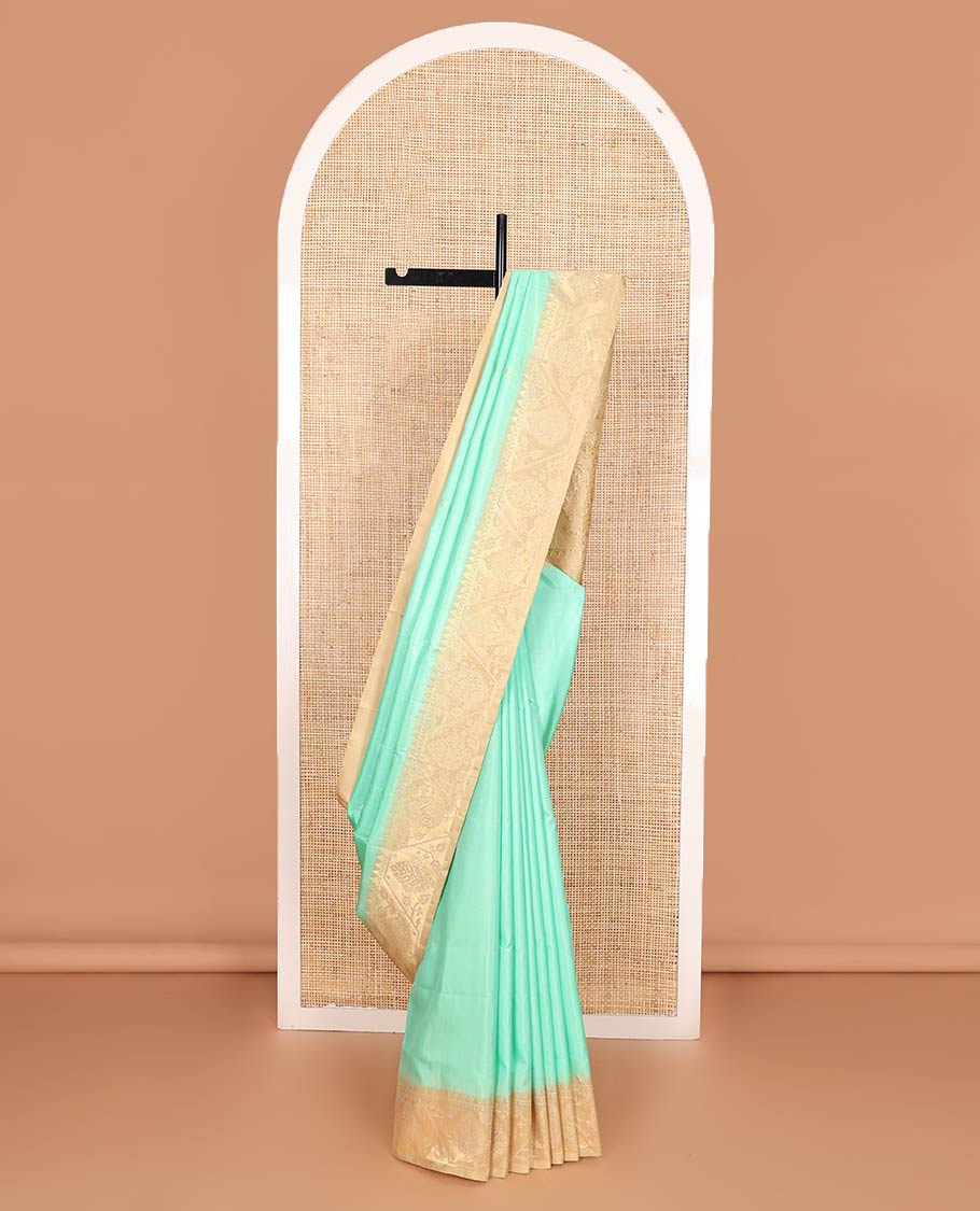 Turquoise blue zari buttas Mayuri soft silk saree, contrast border, and pallu of paithani-style motifs weave