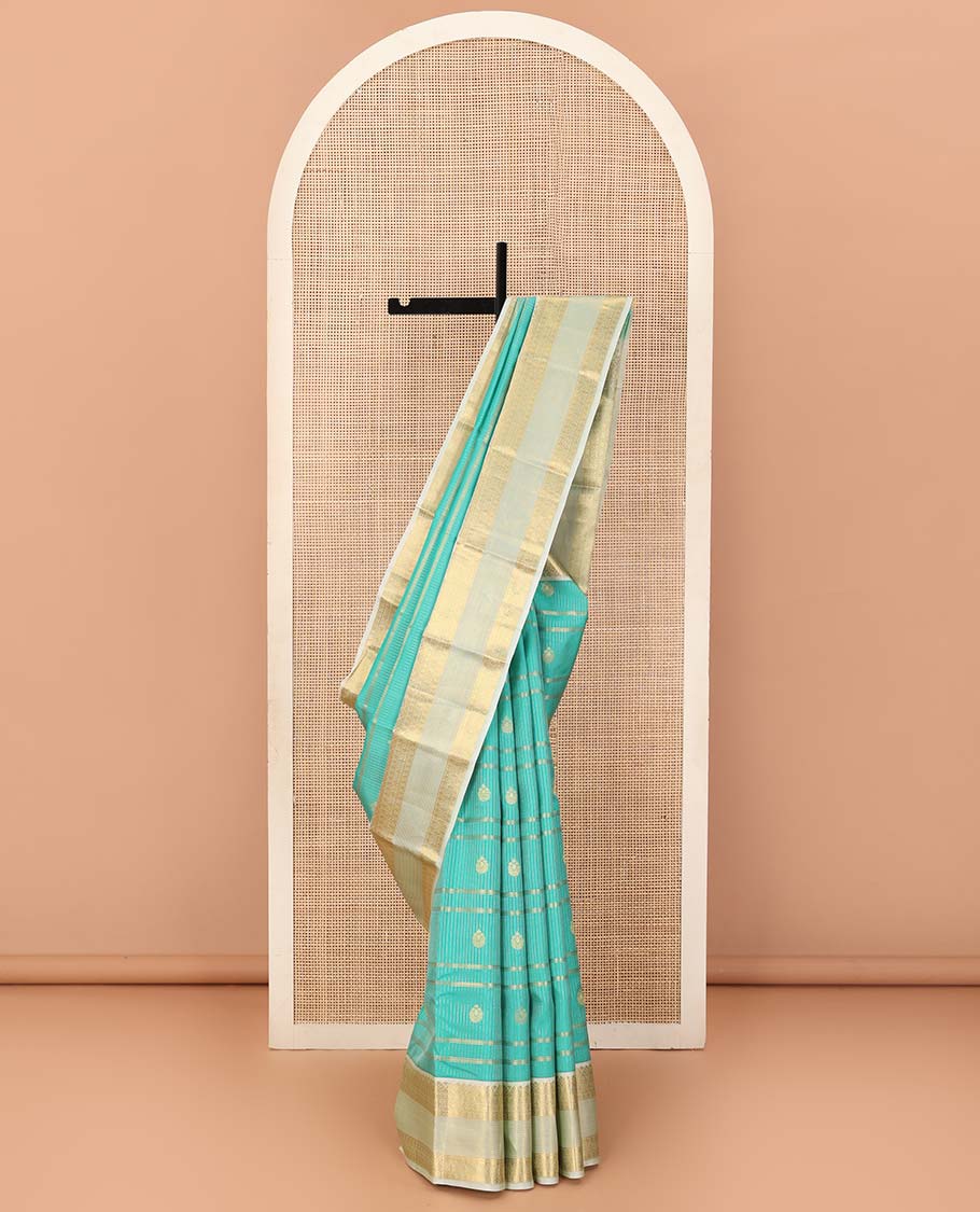 Turquoise blue zari design Vasundhara silk saree, contrast traditional motifs steeped zari border, and zari-rich jaal pallu