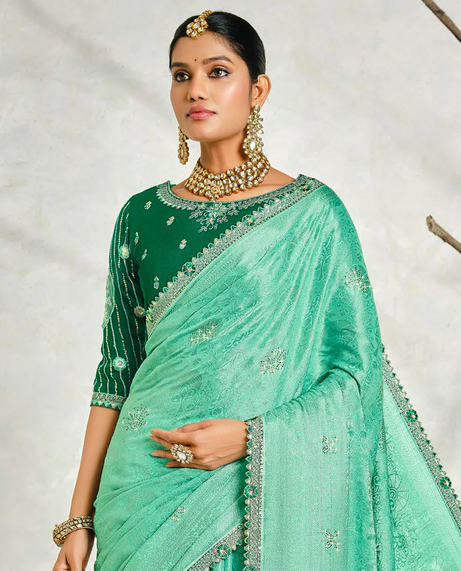 Turquoise floral embossed & stonework designer saree, traditional design & lace work scallop border & intricate stonework pallu - Image 2