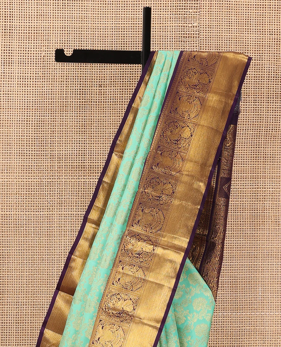 Turquoise jacquard wedding silk saree, contrast border of mayil, and iruthalai pakshi design, and floral design pallu - Image 4