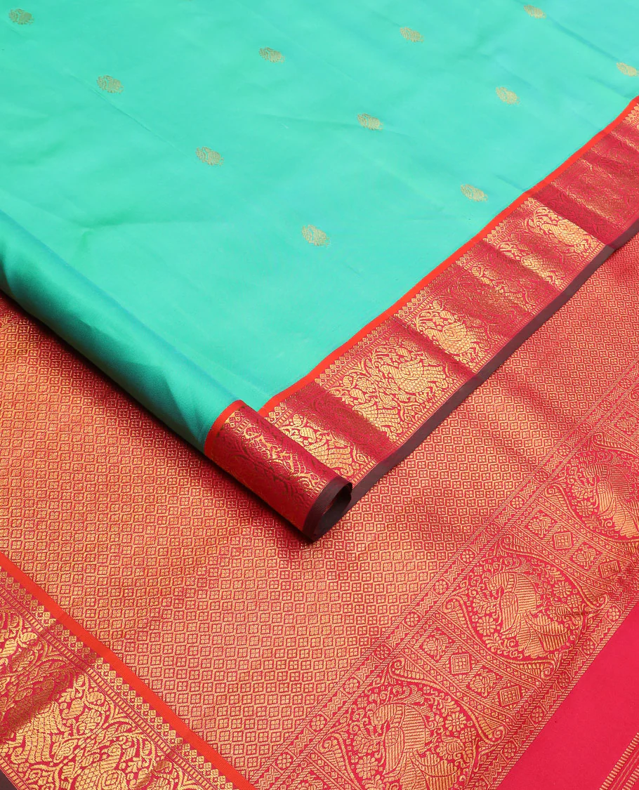 Turquoise mayil buttas silk saree, contrast border of thilakam mokku, muthu, and mayil designs, and jaal pallu - Image 2