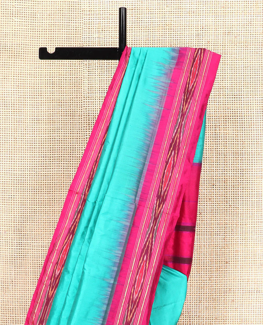 Turquoise Plain Ikkat Silk Saree with a Contrast Pink Border Completed by a Hazy Ikkat Weave, Featuring a Pallu with Stripes and Ikkat Texture - Image 3