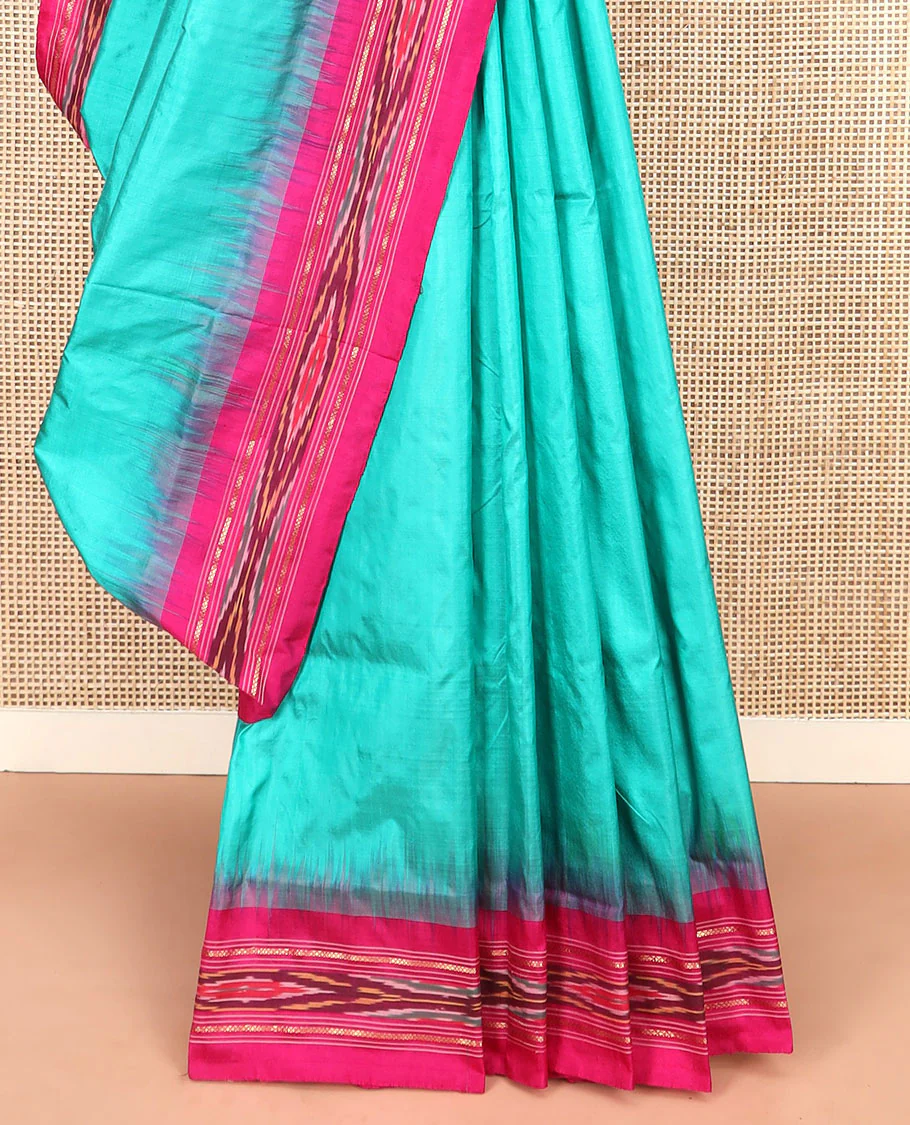 Turquoise Plain Ikkat Silk Saree with a Contrast Pink Border Completed by a Hazy Ikkat Weave, Featuring a Pallu with Stripes and Ikkat Texture - Image 4