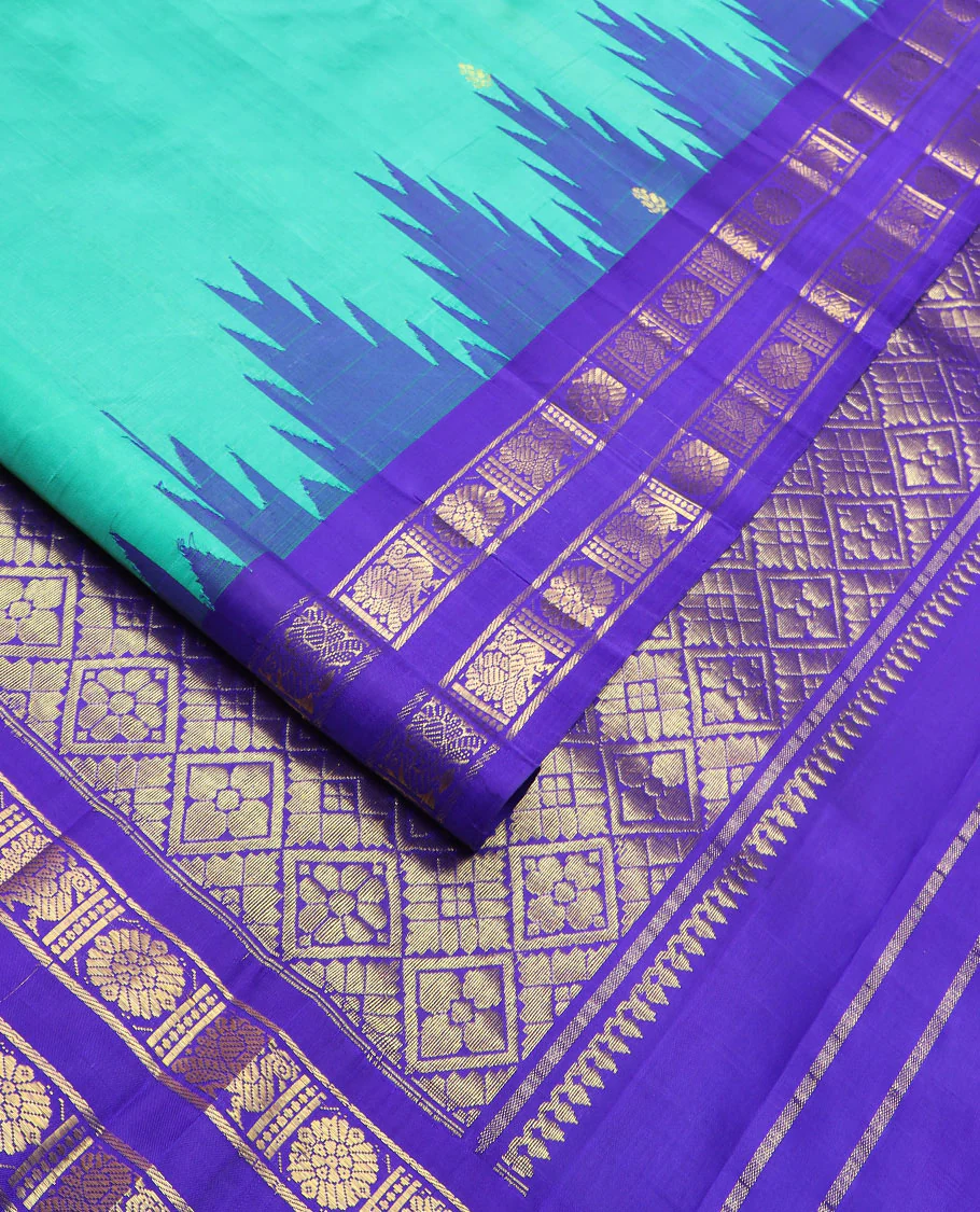 Turquoise zari buttas Kanchipuram silk saree, contrast thazampoo rekku rettai pettu border of annam chakram designs, and zari-rich jaal pallu - Image 2