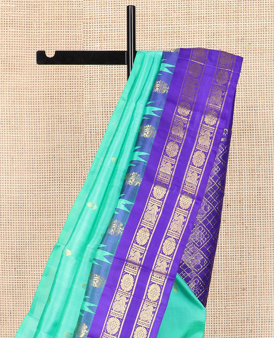 Turquoise zari buttas Kanchipuram silk saree, contrast thazampoo rekku rettai pettu border of annam chakram designs, and zari-rich jaal pallu - Image 3