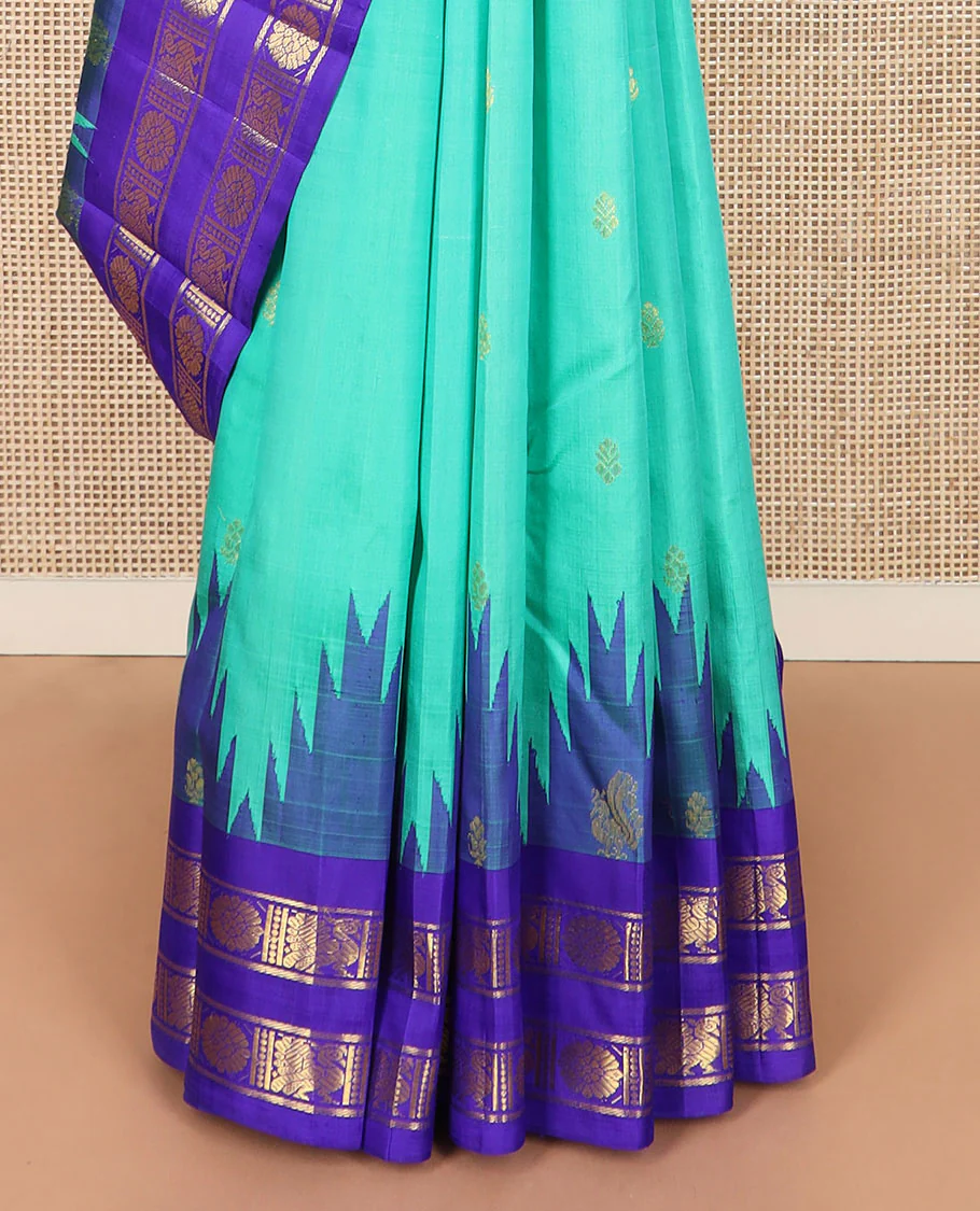 Turquoise zari buttas Kanchipuram silk saree, contrast thazampoo rekku rettai pettu border of annam chakram designs, and zari-rich jaal pallu - Image 4