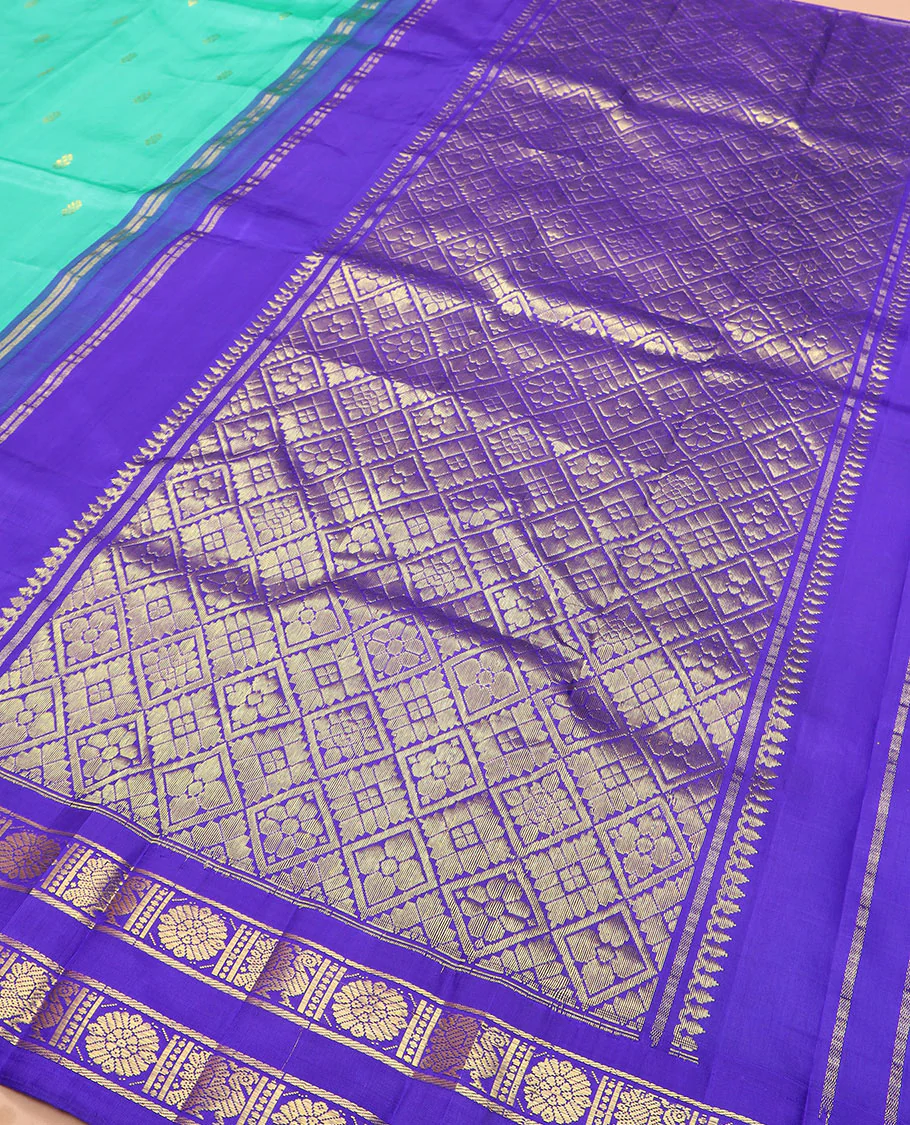 Turquoise zari buttas Kanchipuram silk saree, contrast thazampoo rekku rettai pettu border of annam chakram designs, and zari-rich jaal pallu - Image 5