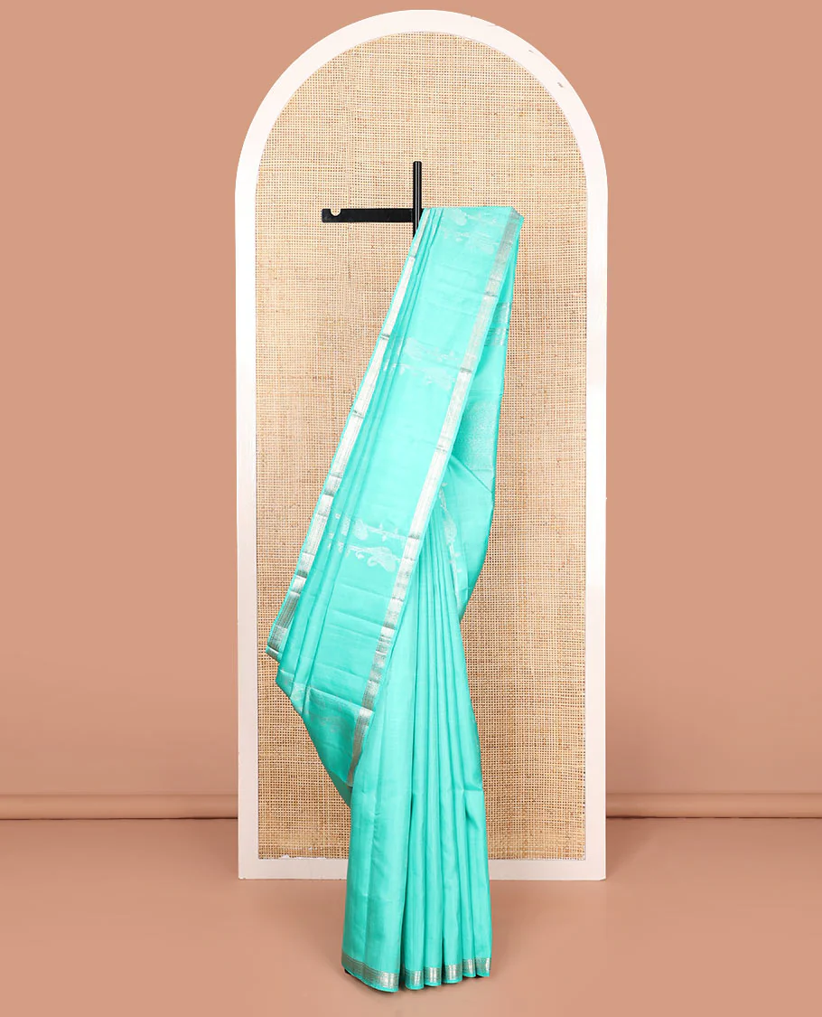 Turquoise zari design Mayuri soft silk saree, zari border of kathir designs, and zari-rich pallu