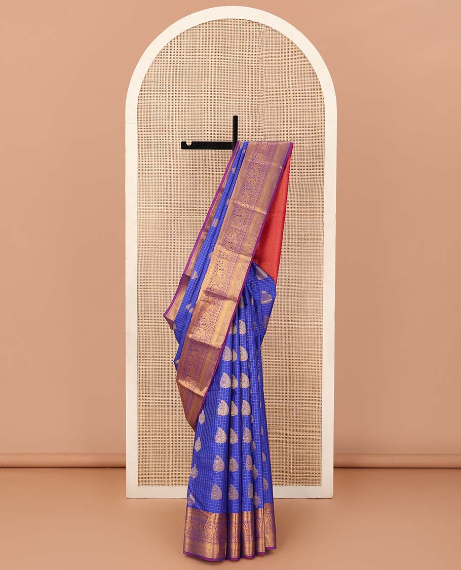 Ultramarine blue checked and zari buttas Vasundhara silk saree, contrast border of mayil kann, banaras, vanki, neli, and mayil, and jaal pallu