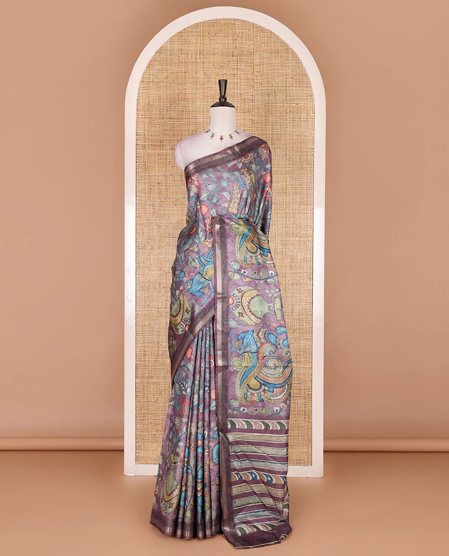 Violet-base multi-color kalamkari floral-vine and peacocks printed semi-tussar saree, gold zari piping border, kalamkari printed pallu, and contrast printed blouse - Image 2