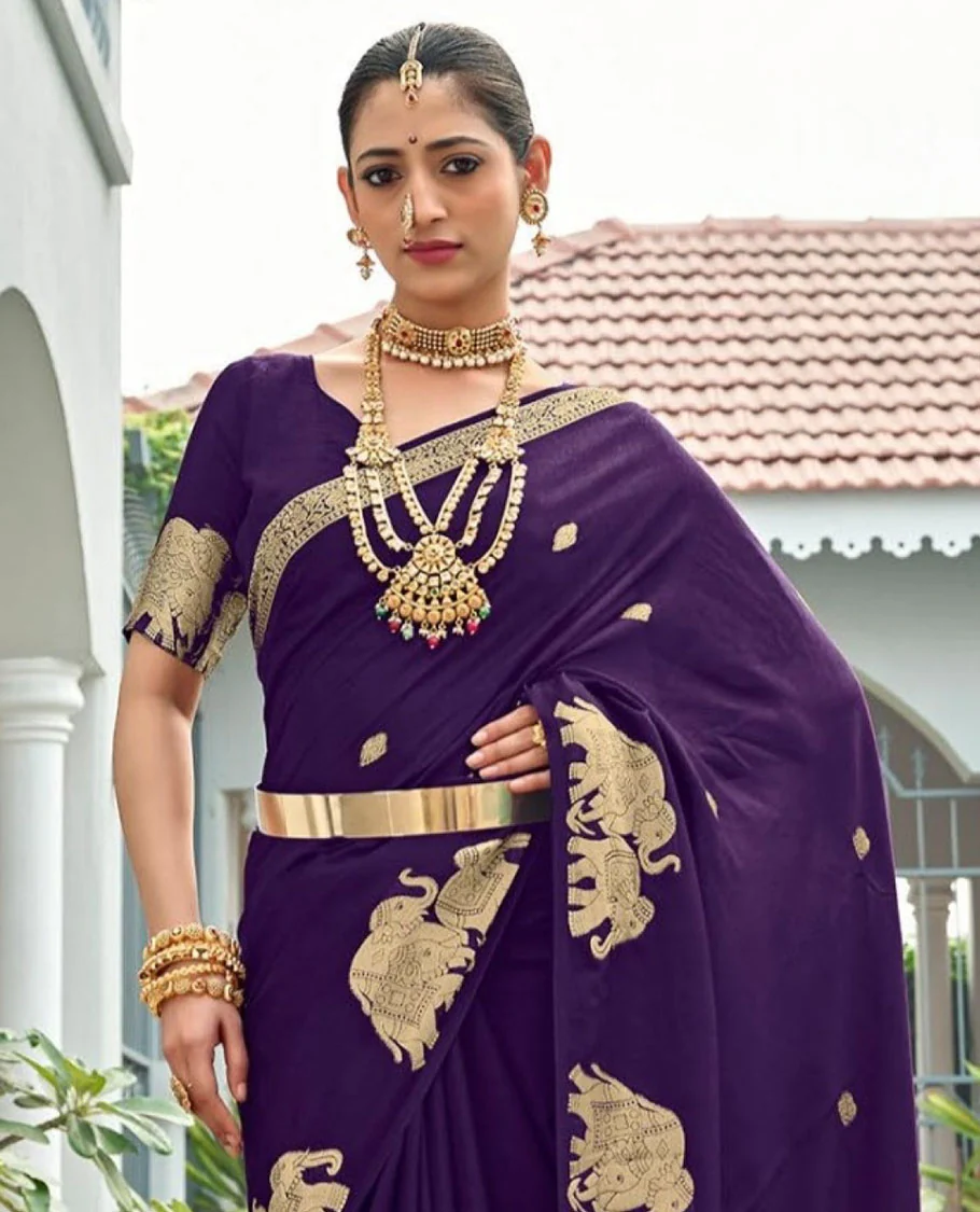 Violet Designer Saree Highlighted with Zari Buttas, Featuring a Self-Border Depicting a Herd of Elephants, Subtly Woven Pallu of Spare Stripes, and Paired with a Matching Blouse of Elephant Motifs - Image 2