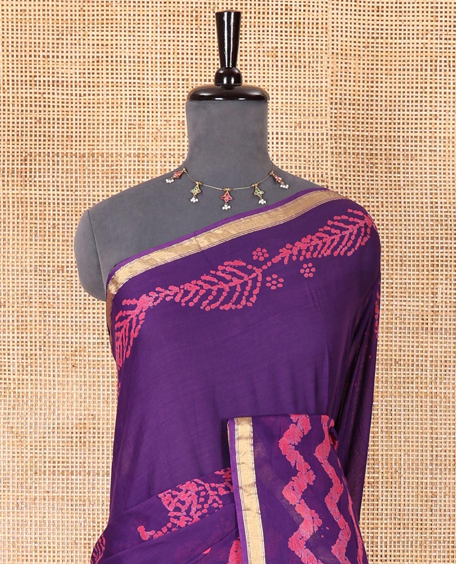 Violet wax batik-style zig-zag printed pure cotton saree, gold zari piping border, human figurines batik printed pallu, and a matching blouse - Image 3