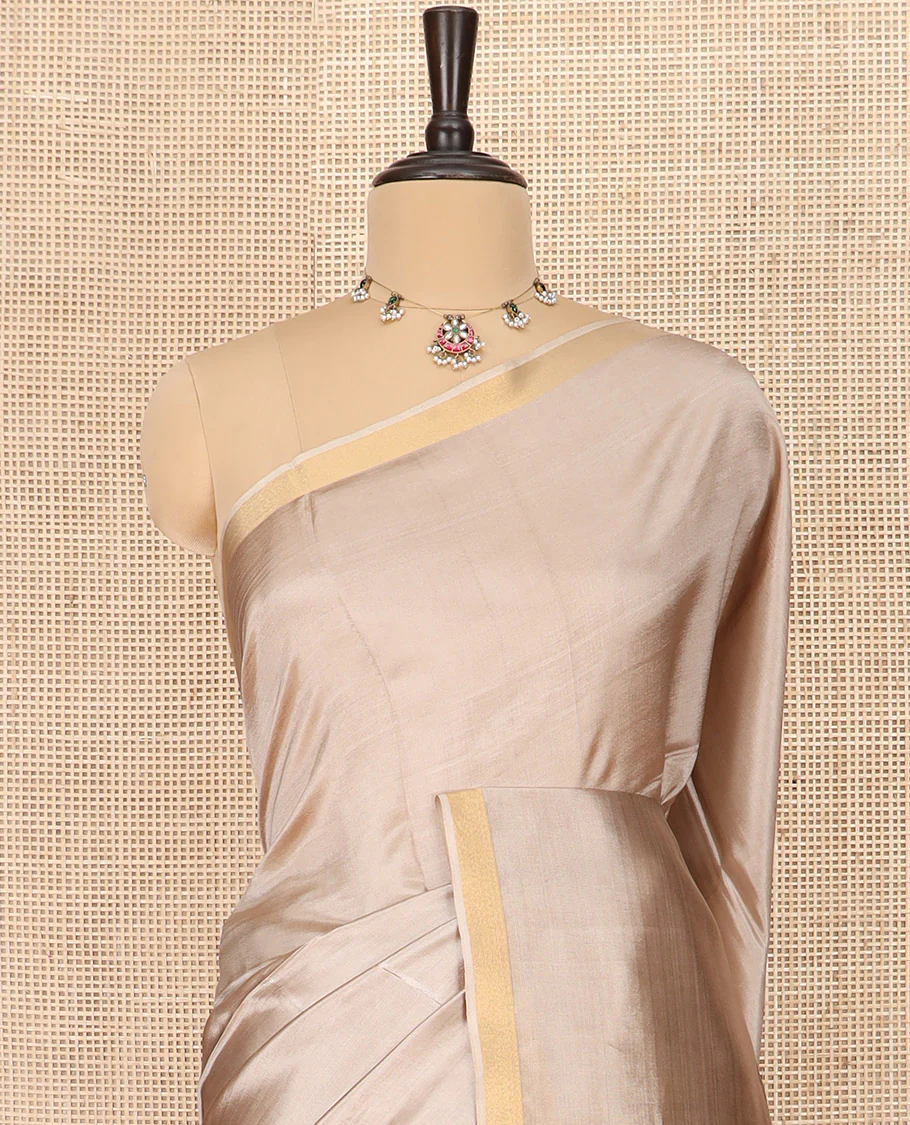 Warm Ivory Plain Banana Pith Saree Subtly Sparkled with Zari Bavanji Border, Gleaming Zari Stripes Woven Pallu, and Paired with a Matching Plain Blouse - Image 2