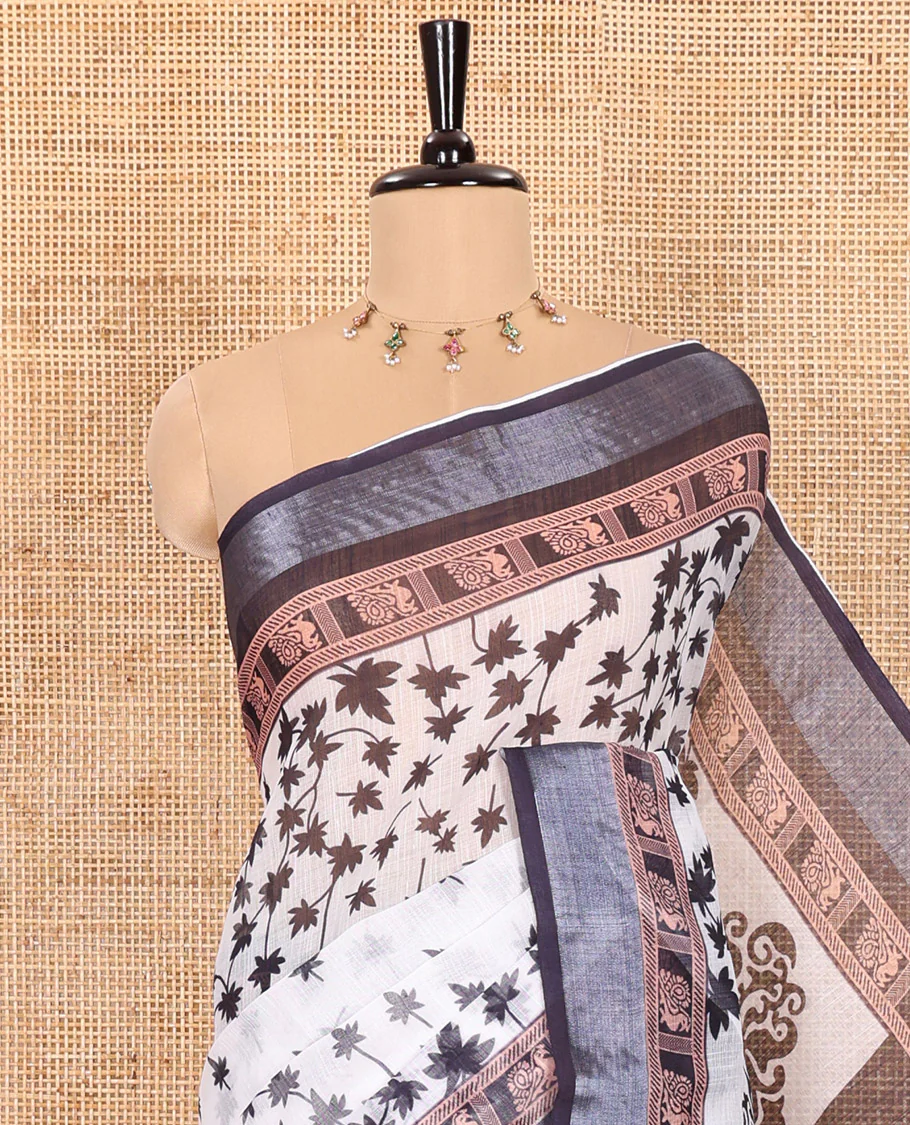 White and Black Linen Cotton Saree Featuring Field Maple Leaf Motifs Printed All Over the Body, Complemented by a Contrast Zari and Peacock-Printed Border, Pallu of Geometric Print, and Paired with a Contrast Checked Blouse - Image 2
