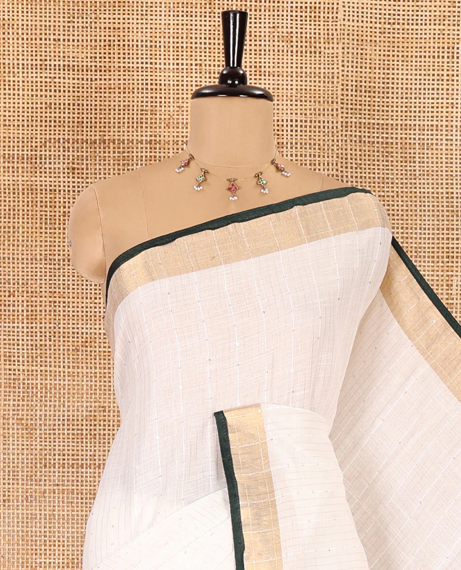 White and green sequins striped Linen cotton saree, contrast zari sequins striped border, striped pallu, and a contrast plain blouse - Image 2
