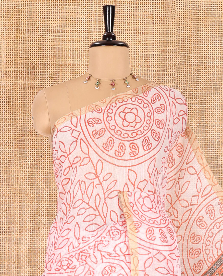 white bandhani-style floral and chakra printed saree, zari piping border, contrast ajrakh printed pallu, and contrast ajrakh printed blouse - Image 2