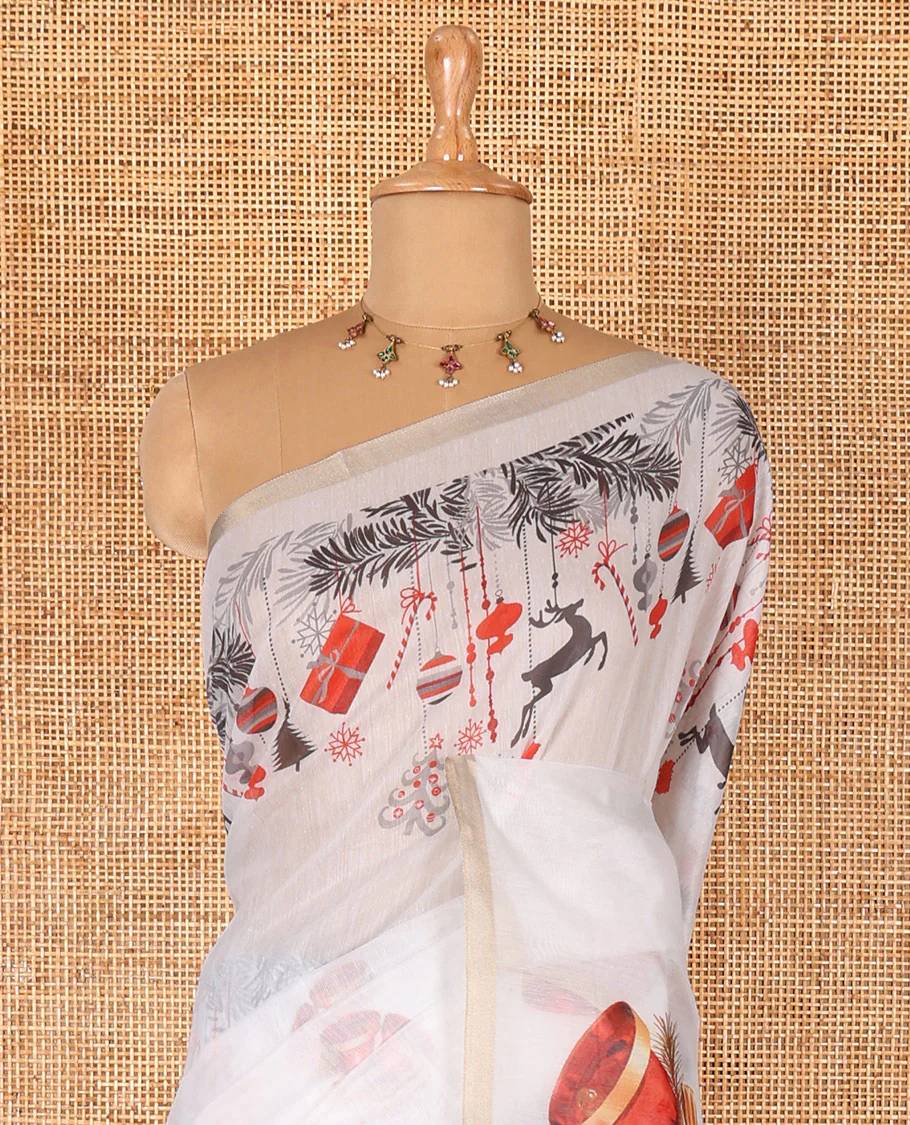 White Christmas-theme digital printed Chanderi cotton saree features bell motifs, piping zari border, big bell printed pallu, and blouse of tiny bell motifs print - Image 3