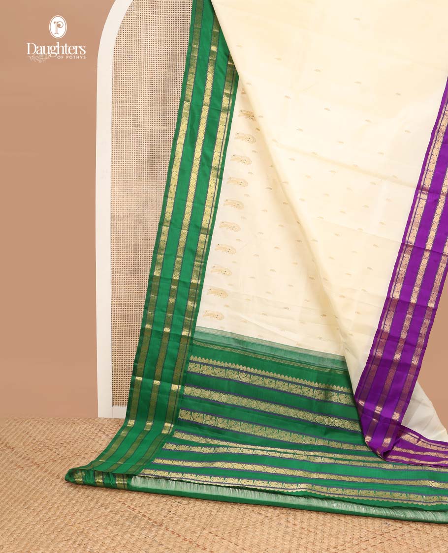 White floral buttas kancheepuram silk saree with contrast ganga jamuna, korvai border of thilakam mokku, poo chakram, mayil design & zari design pallu - Image 4
