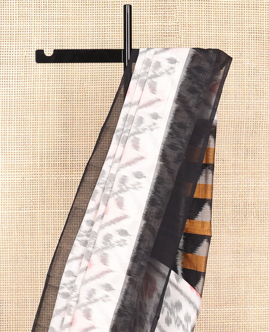 White floral design ikkat cotton saree with contrast border & geometric design pallu - Image 3