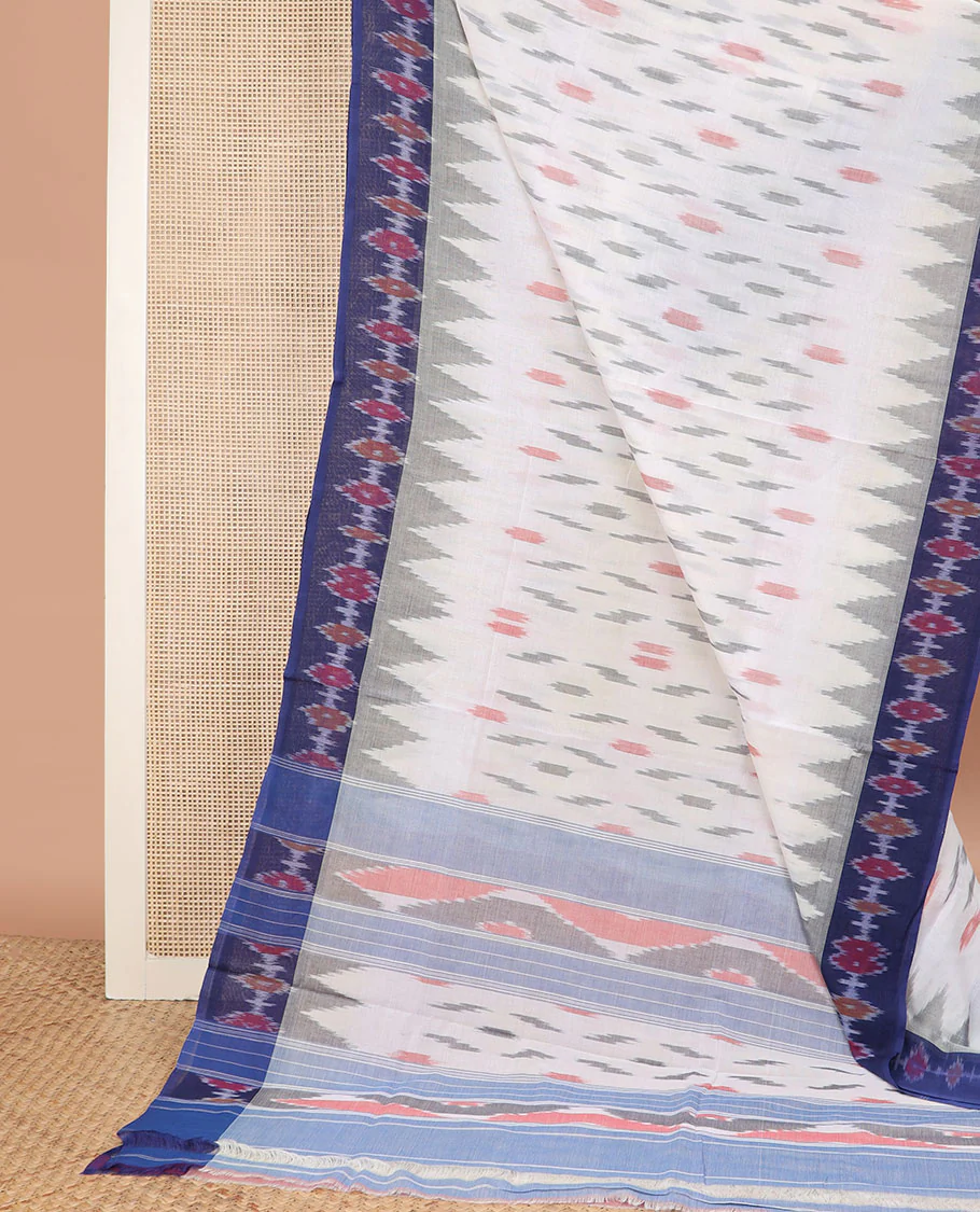 White Ikkat Cotton Saree Detailed with Geometric Patterns in Hazily Ikkat Weave, Complemented by a Contrast Ikkat Border, and Pallu of Ikkat Patterns - Image 2