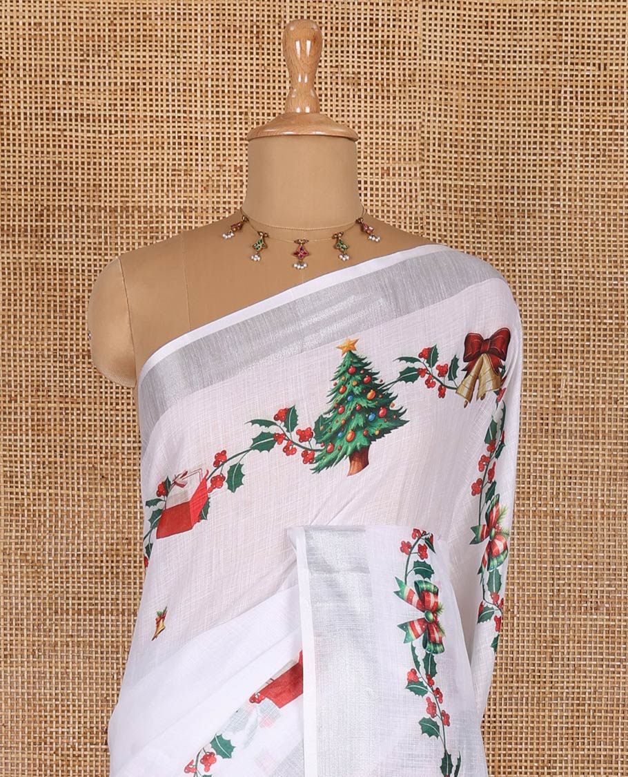 White jingle bell and Christmas tree motifs printed linen saree with bavanji borders, Santa Claus figure printed pallu, and a contrast jingle bell printed blouse - Image 4