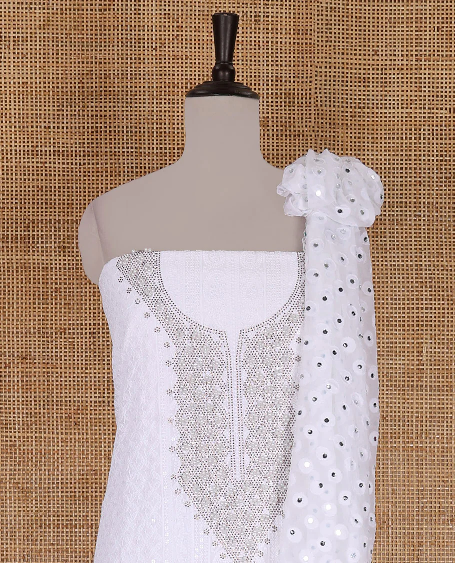 White material churidar set, stone work with Schiffli style embroidered georgette top, American Crape bottom, and polka dotted printed mirror work dupatta - Image 3