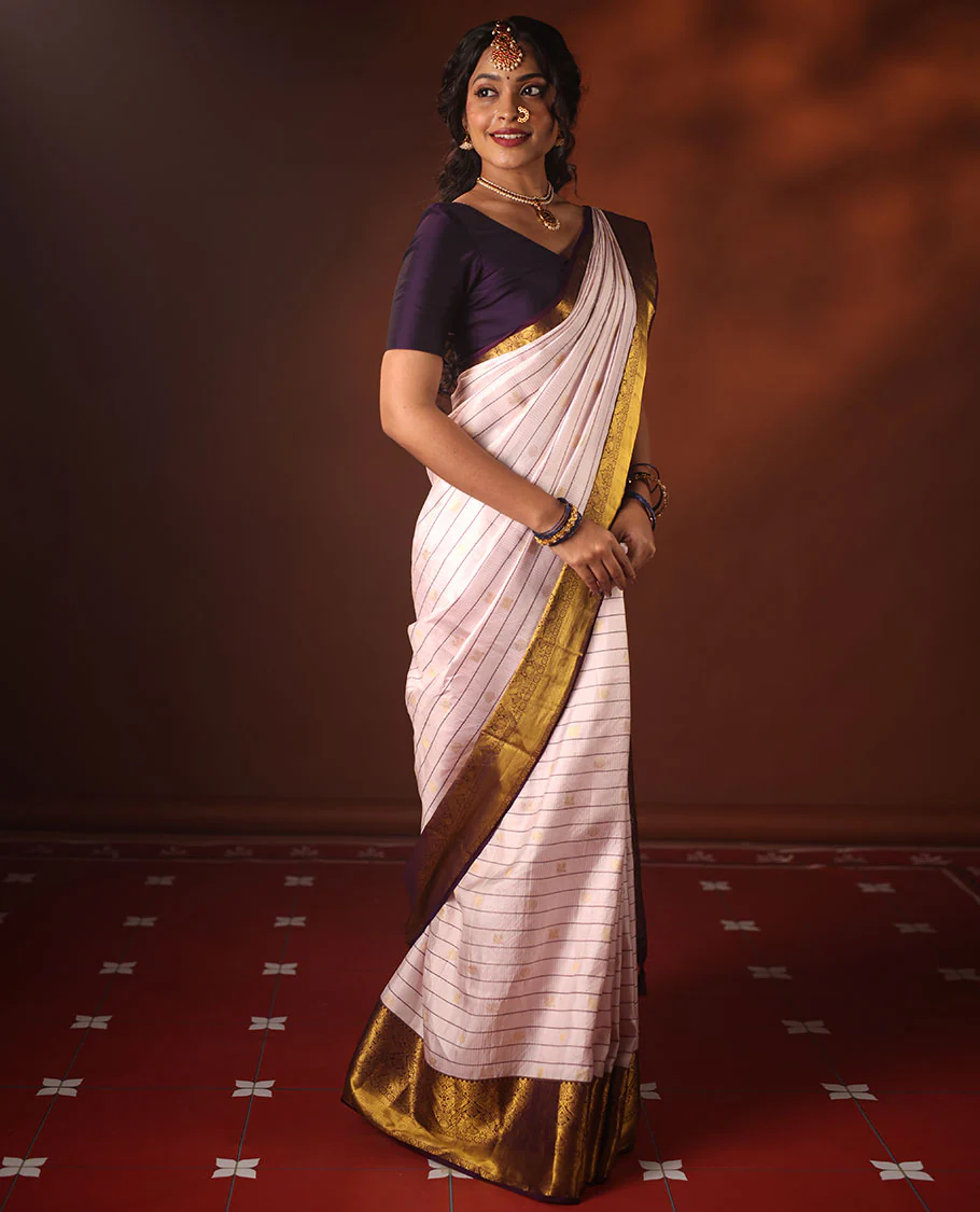 White Vasundhara silk saree adorned with Mayil Chakram, Neli, and Muthu stripes, featuring a contrast border with Laddu Kamalam, Mayil, Yaali, and Mayil Kann designs, along with a Jaal design pallu - Image 4