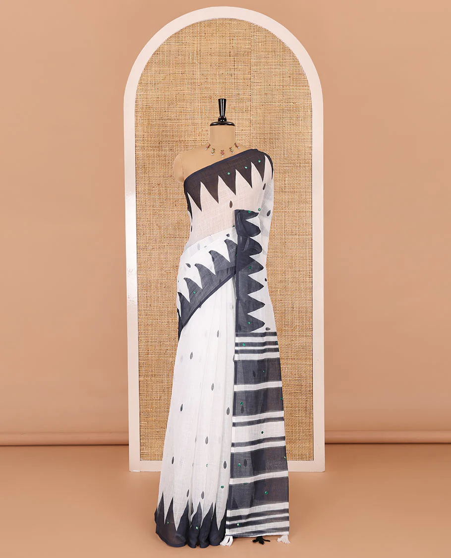White thilakam buttas and mirror work khadi mul cotton saree, contrast temple border, striped and buttas pallu, and a contrast printed blouse - Image 2