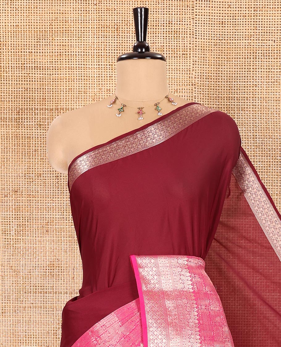 Wine and Rani Pink Half-And-Half Style Art Crepe Saree Artfully Detailed with Plain and Jacquard Design, Complemented by a Contrast Border of Traditional Zari Designs, Pallu Featuring Zari Stripes, and Paired with a Matching Blouse - Image 2