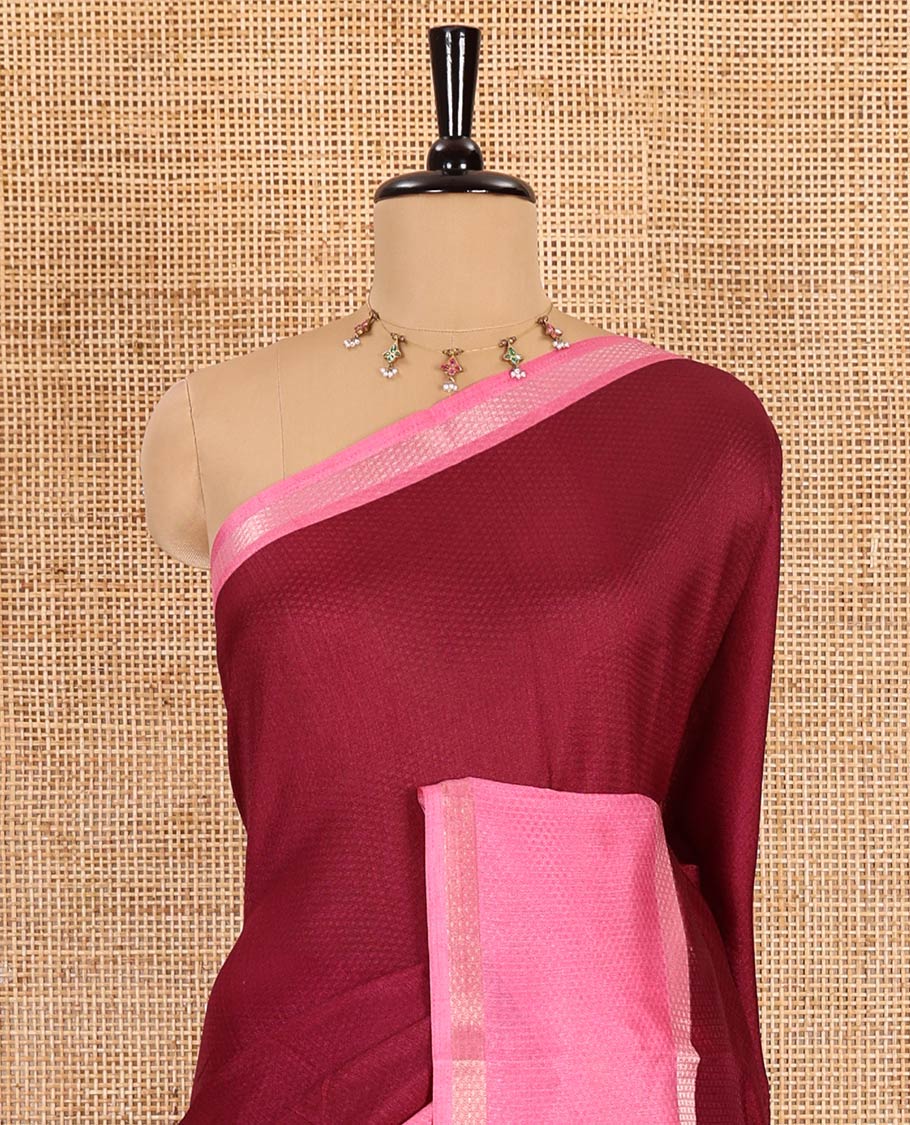 Wine embossed moss chiffon saree, contrast traditional rettai pettu border, embossed pallu, and a contrast embossed blouse - Image 3
