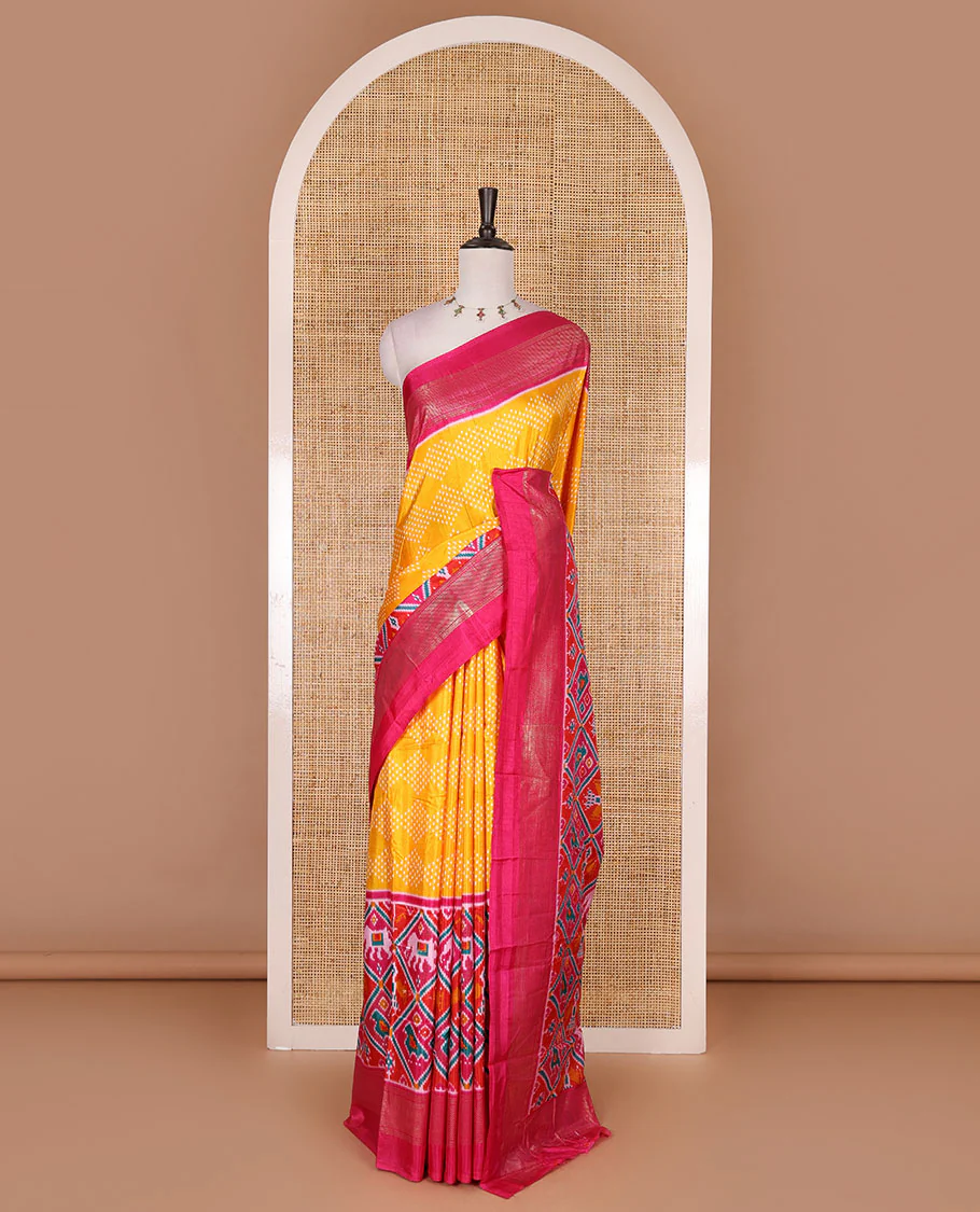 Yellow bandhani dotted dola silk saree, contrast patola style animal motifs enclosed diamond gird zari border, and contrast printed blouse - Image 2
