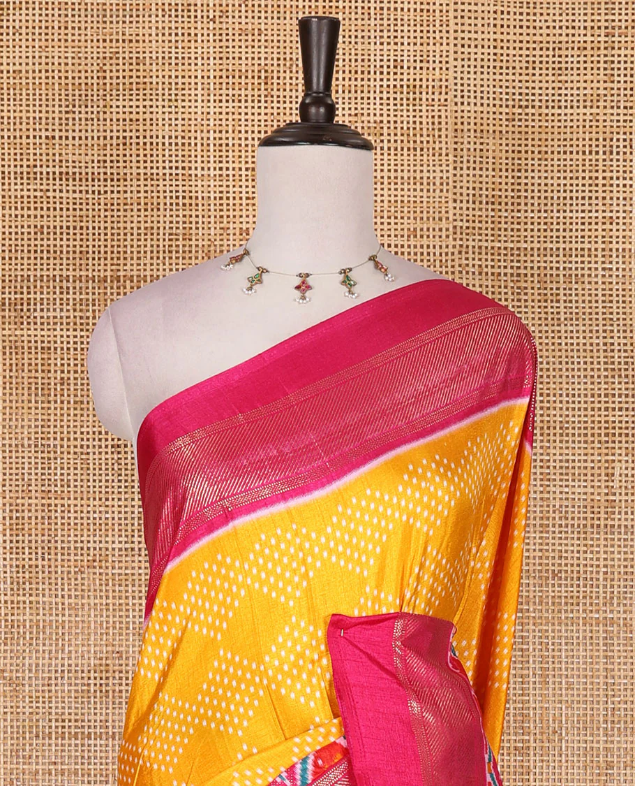 Yellow bandhani dotted dola silk saree, contrast patola style animal motifs enclosed diamond gird zari border, and contrast printed blouse - Image 3