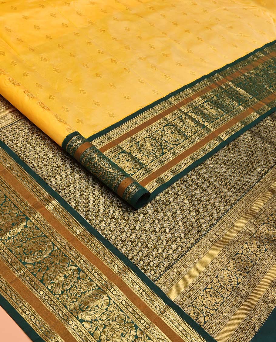 Yellow buttas Bangalore silk saree, contrast traditional zari border of peacocks, and pallu steeped with floral designs - Image 2