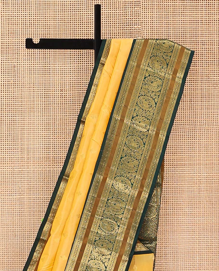 Yellow buttas Bangalore silk saree, contrast traditional zari border of peacocks, and pallu steeped with floral designs - Image 3