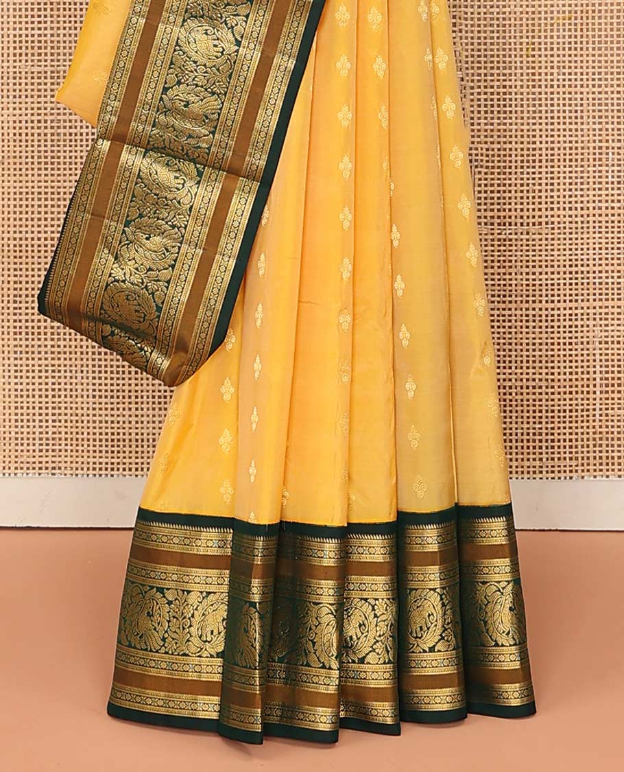Yellow buttas Bangalore silk saree, contrast traditional zari border of peacocks, and pallu steeped with floral designs - Image 4