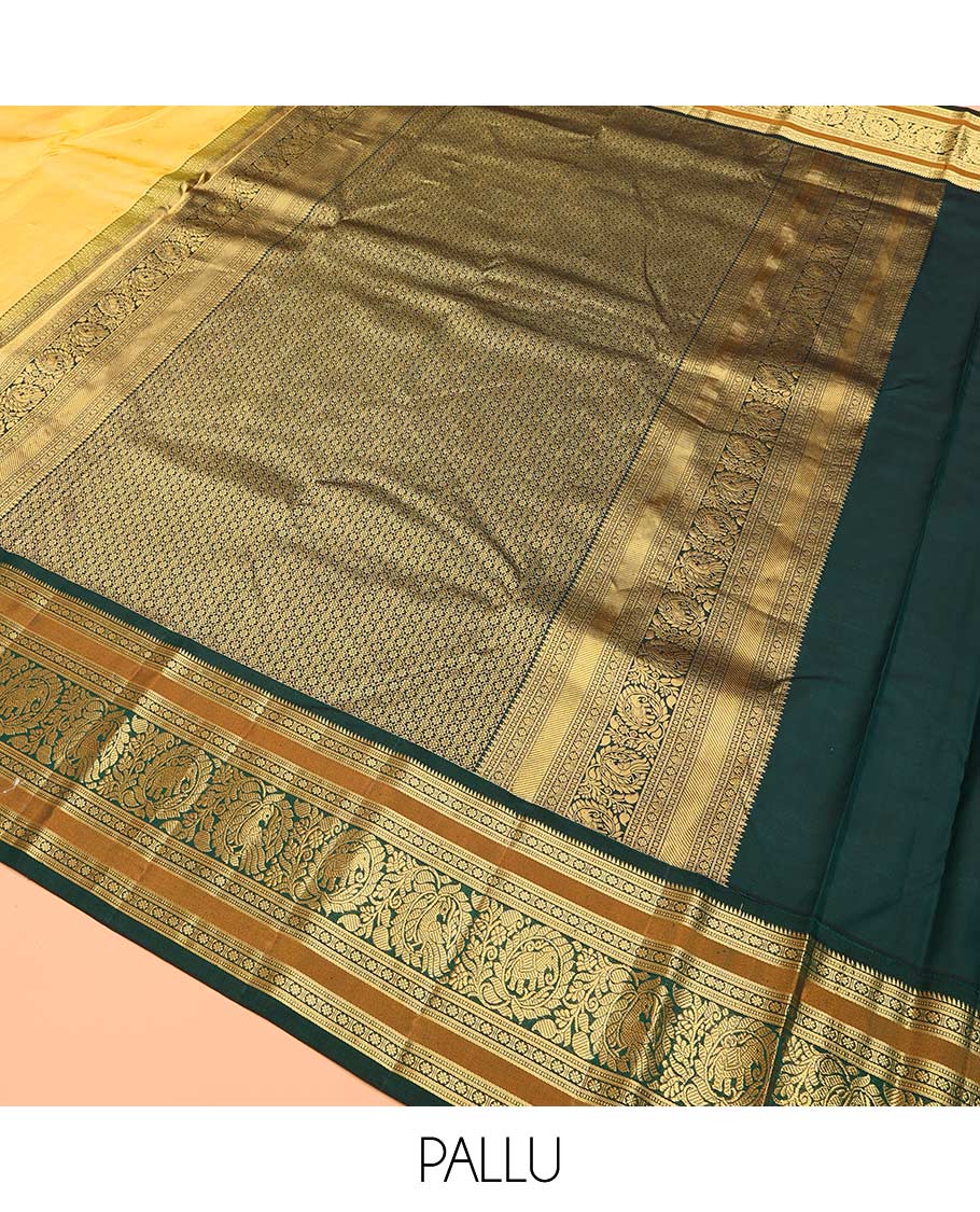 Yellow buttas Bangalore silk saree, contrast traditional zari border of peacocks, and pallu steeped with floral designs - Image 5