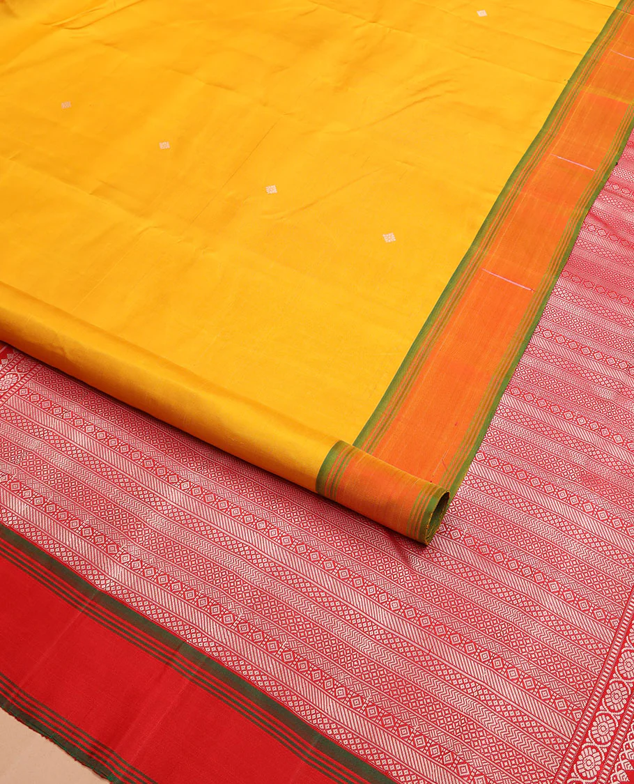 Yellow buttas Kanchipuram silk saree, contrast border of malli mokku designs, and pallu of geometric designs - Image 2