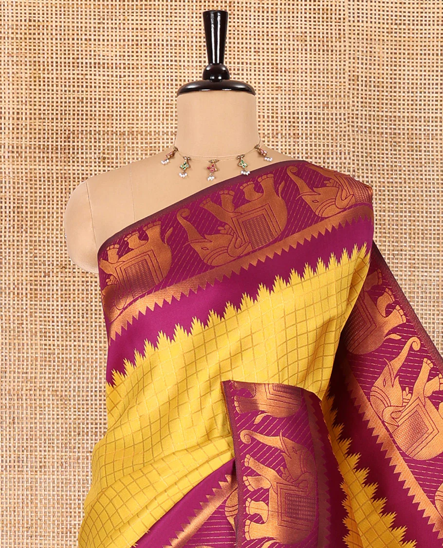 Yellow checked design litchi saree, contrast temple elephant motifs border, geometric patterned pallu, and a contrast jacquard blouse - Image 2
