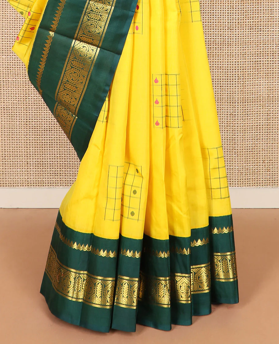 Yellow daayam kattam inspired motifs Kanchipuram silk saree, contrast korvai rettai pettu border of thilakam mokku, and manga designs, and pallu of mayil chariot designs - Image 4