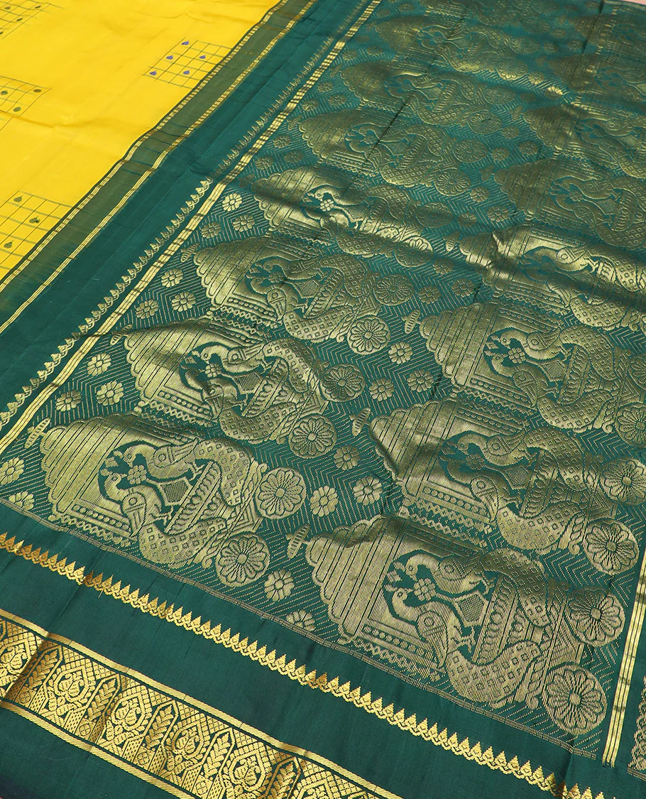 Yellow daayam kattam inspired motifs Kanchipuram silk saree, contrast korvai rettai pettu border of thilakam mokku, and manga designs, and pallu of mayil chariot designs - Image 5