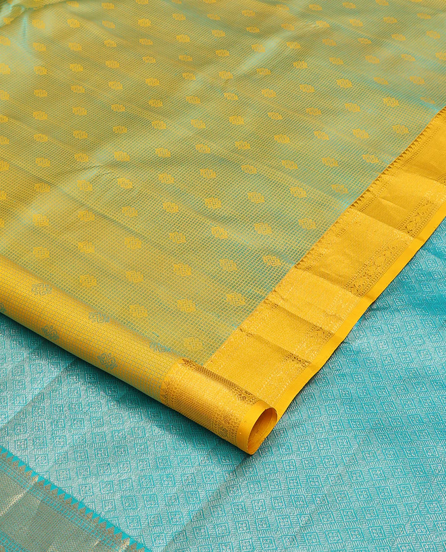 Yellow embossed Parampara silk saree, contrast border of thilakam mokku, muthu, ara bogudi, and kuyil kann, and jaal pallu - Image 2